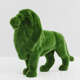 Topiary figure of a standing lion - photo